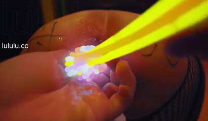 Chinese slut gets her asshole filled with glow sticks