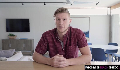 Naked MILF with fake tits Eva Long enjoys dick ride on a couch