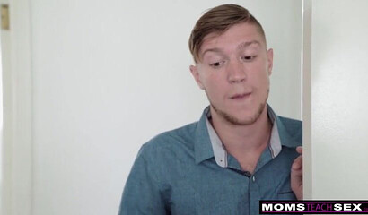 Naked MILF with fake tits Eva Long enjoys dick ride on a couch