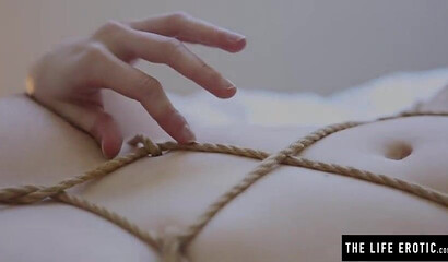 Redhead bitch with big tits masturbates with rope all over her