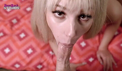 Blonde slut with huge naturals Skylar Vox strips and gives blowjob POV