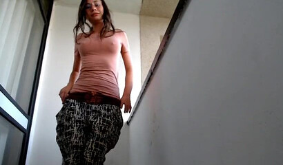 Nerdy Latina with tiny tits sucks dick and rides it on a terrace