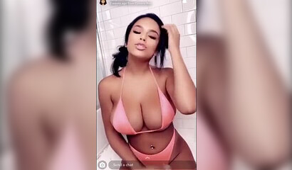 Alluring babe with big boobs masturbates in a solo show